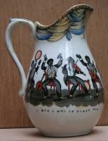 Glazed pottery minstrel jug, with lithograph of band, inscribed below 